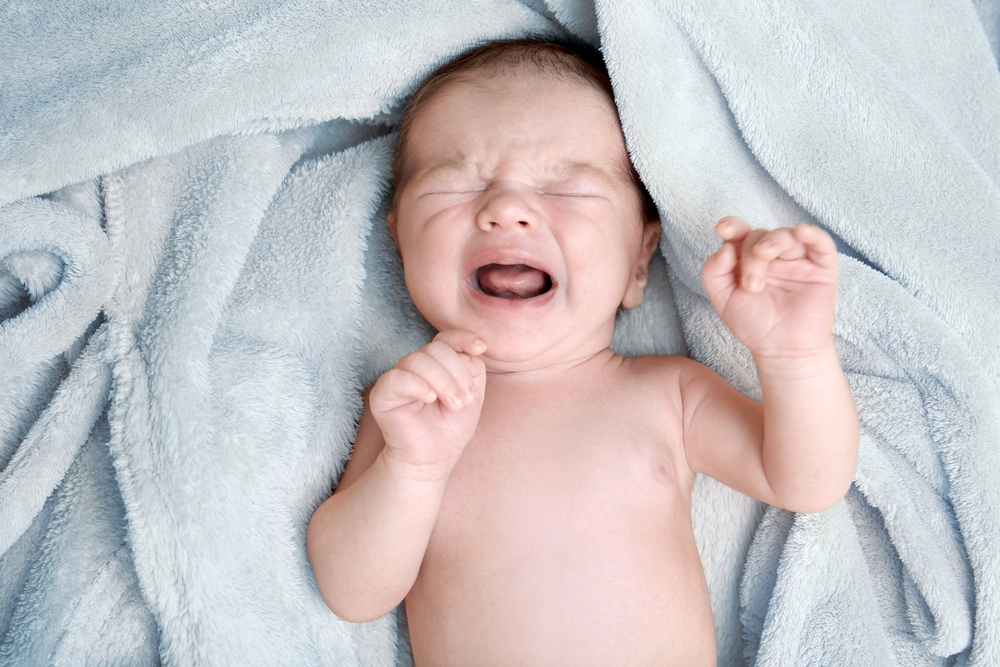Do newborn babies produce tears when they cry
